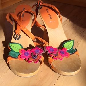 Miu Miu wooden heels made from Italy.